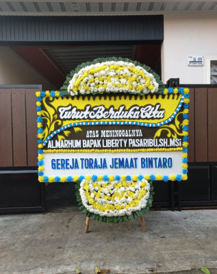 Papan Bunga Duka di Aikmel